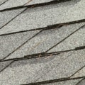 What are the pros and cons of a shingle roof?